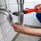 depositphotos_207274982-stock-photo-male-plumber-hand-repairing-sink depositphotos_207274982-stock-photo-male-plumber-hand-repairing-sink